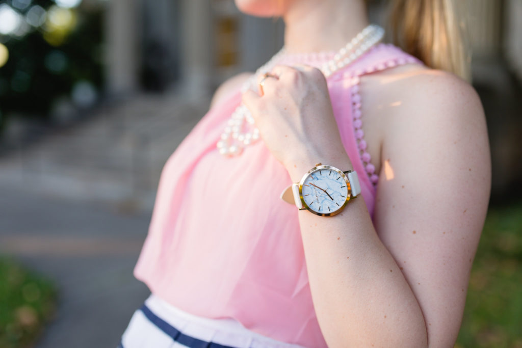 pink blouse christian paul white marble watch
