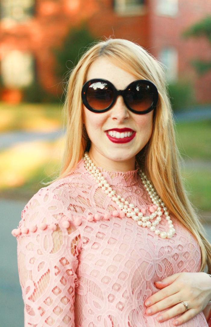 pink lace dress prada sunglasses pom pom